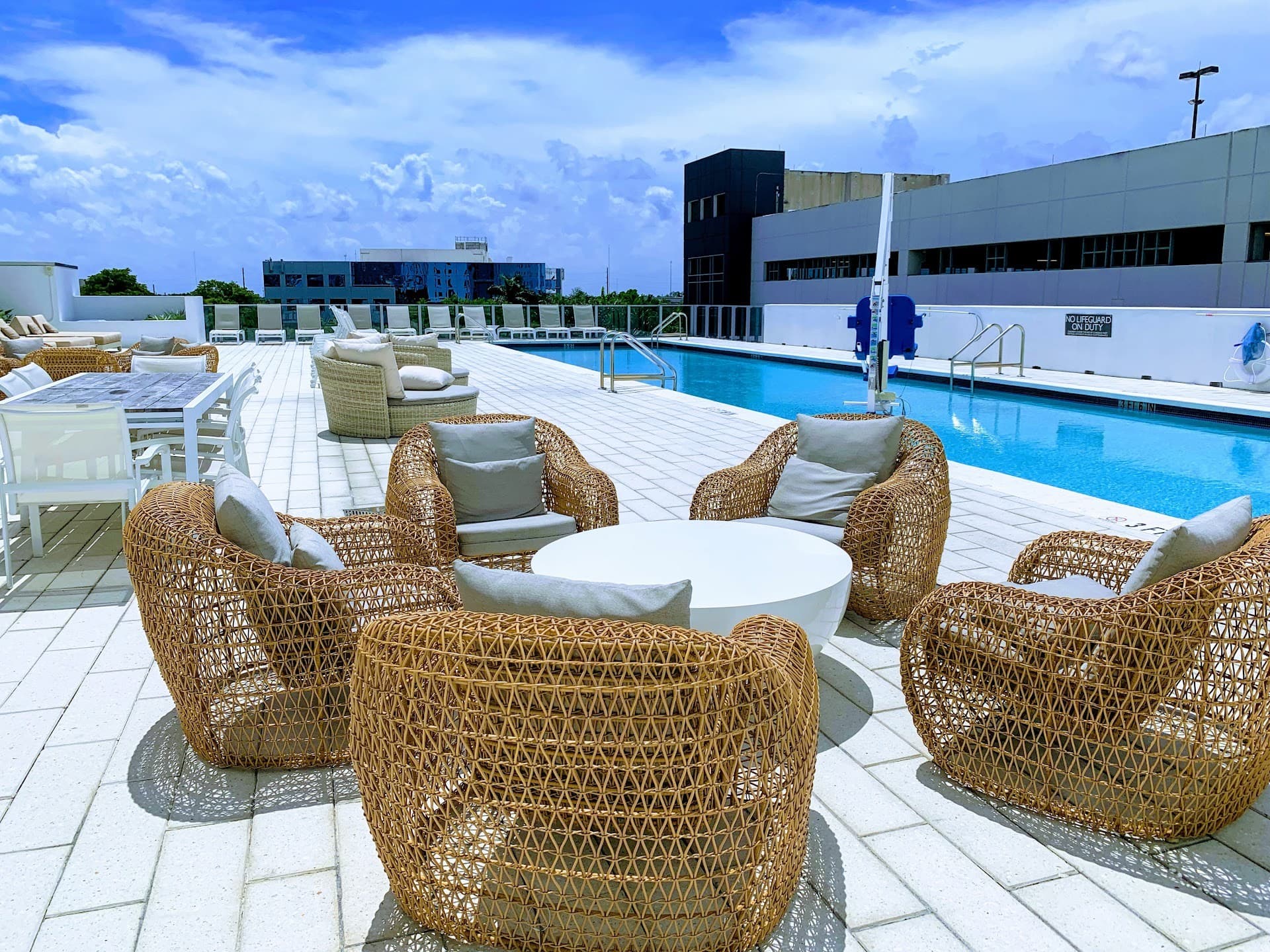 AC Hotel Miami Aventura pool deck in sunny Aventura