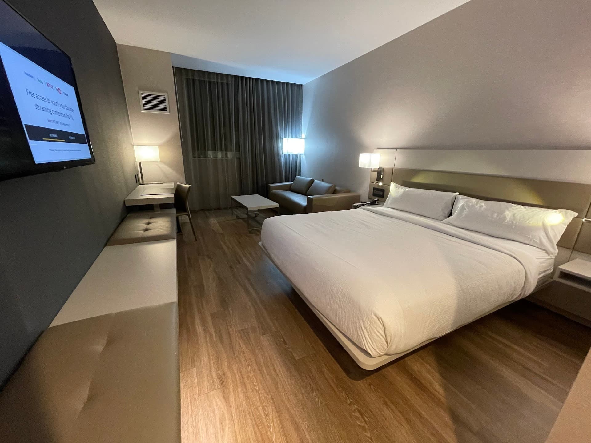 AC Hotel Miami Aventura guest room with modern decor