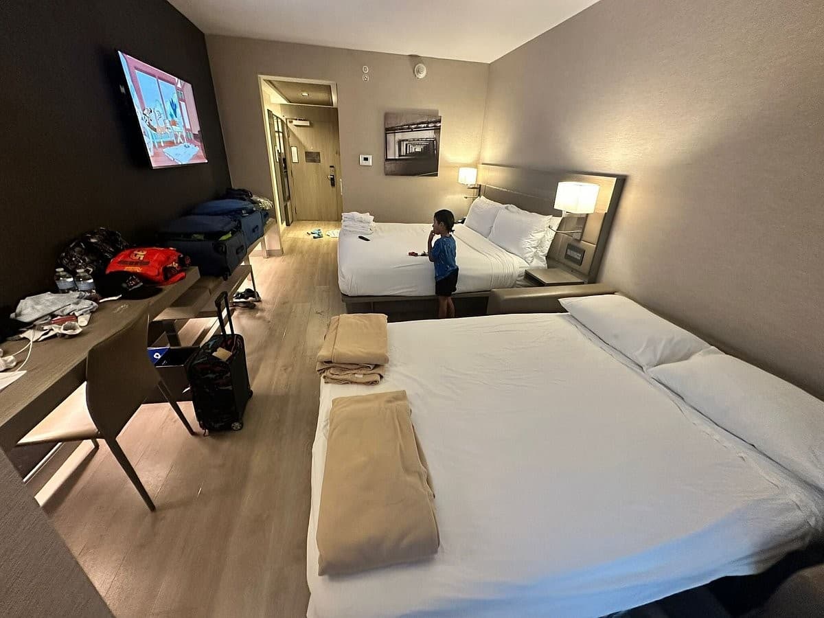 AC Hotel Miami Brickell guest room interior with child