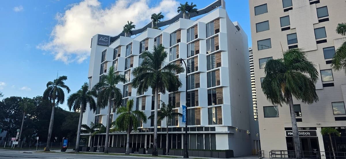 AC Hotel Miami Wynwood exterior view with palm trees