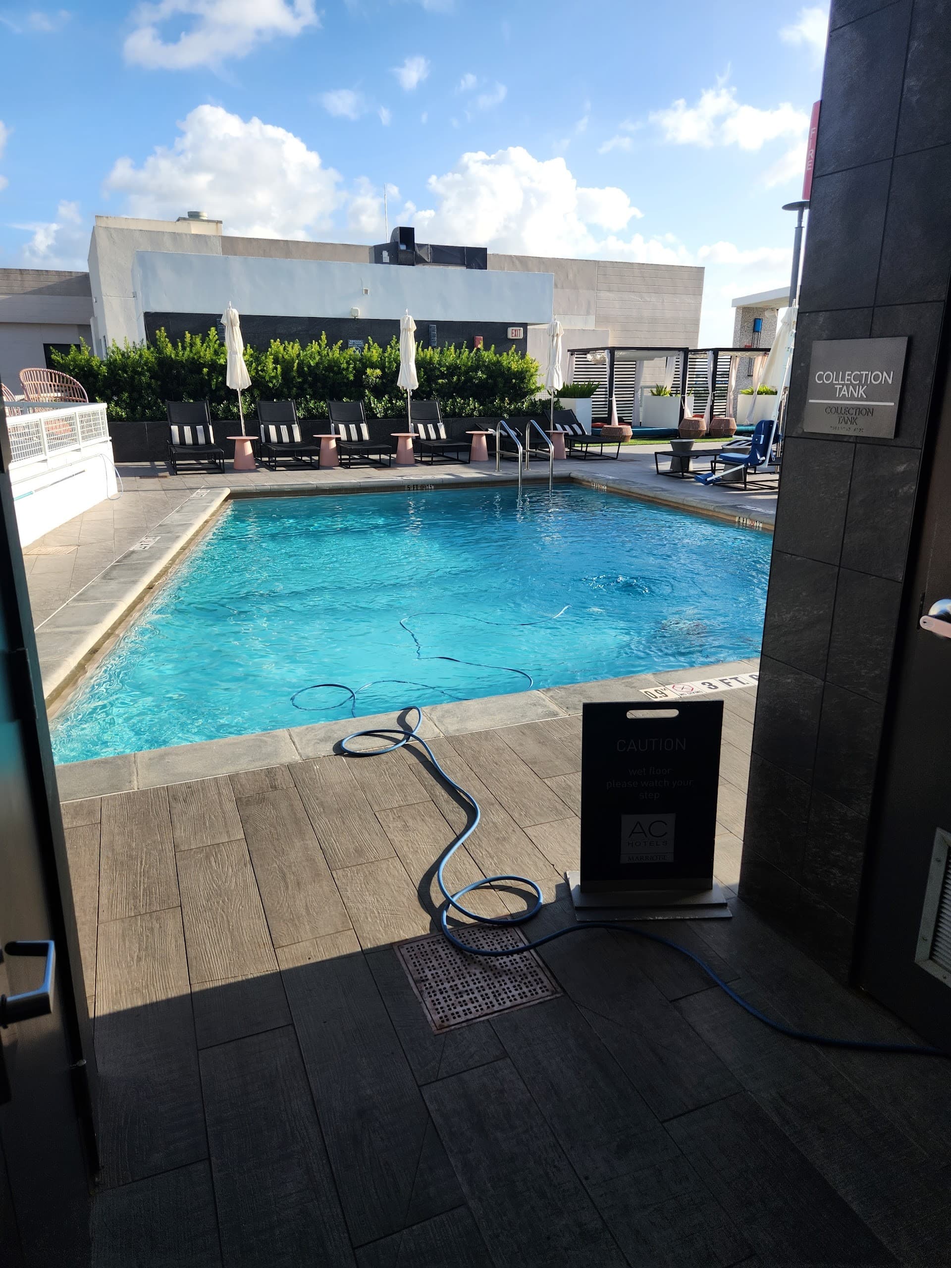 AC Hotel Miami Wynwood pool area with blue water