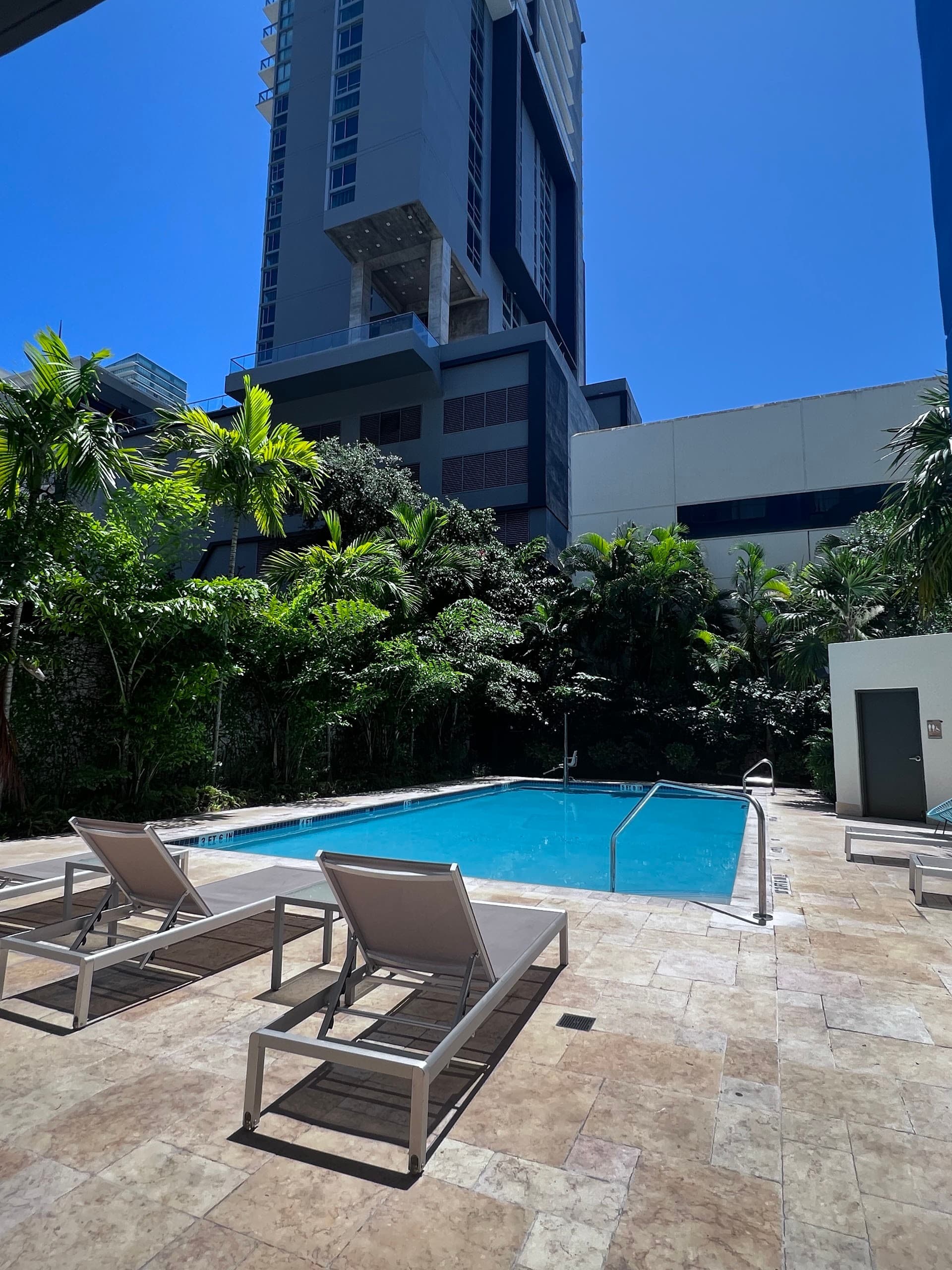 Aloft Miami pool area with lounge chairs