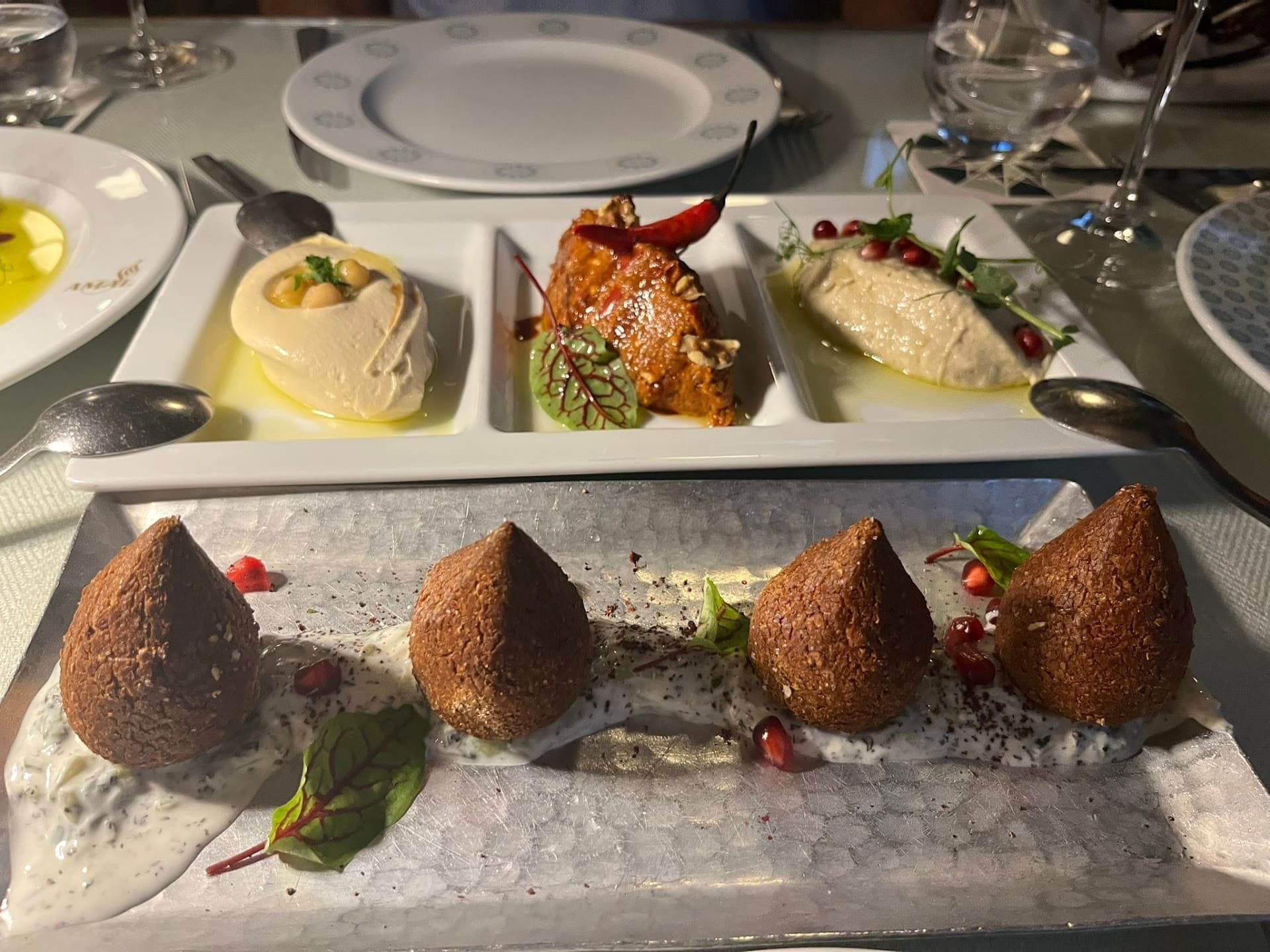 Gourmet dish at Amal Miami featuring delicious Middle Eastern appetizers