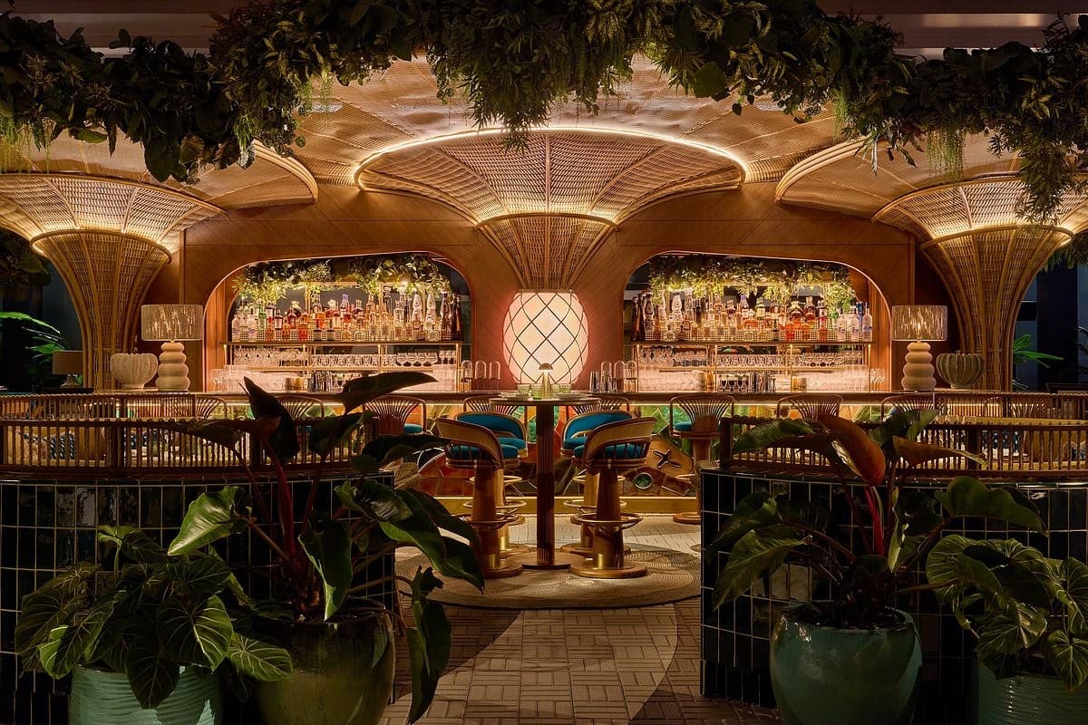 Amazónico Miami bar interior with lush decor