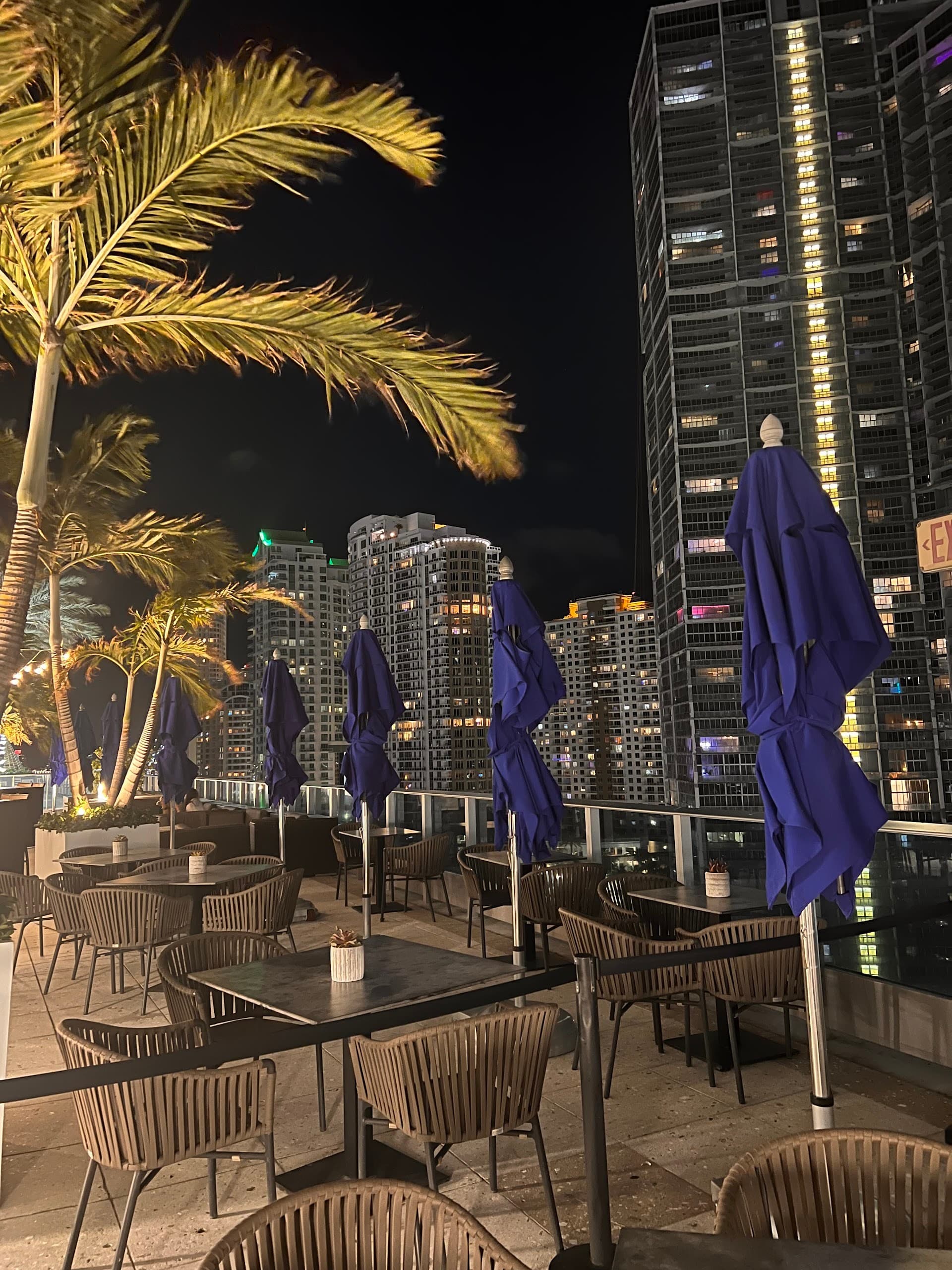 Area 31 nighttime view with seating in Miami
