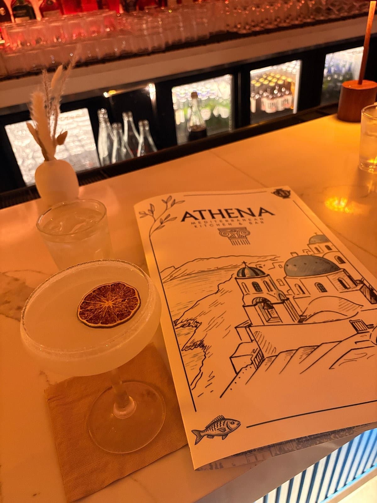 Cocktail and menu at Athena Mediterranean Kitchen & Bar, Miami Beach