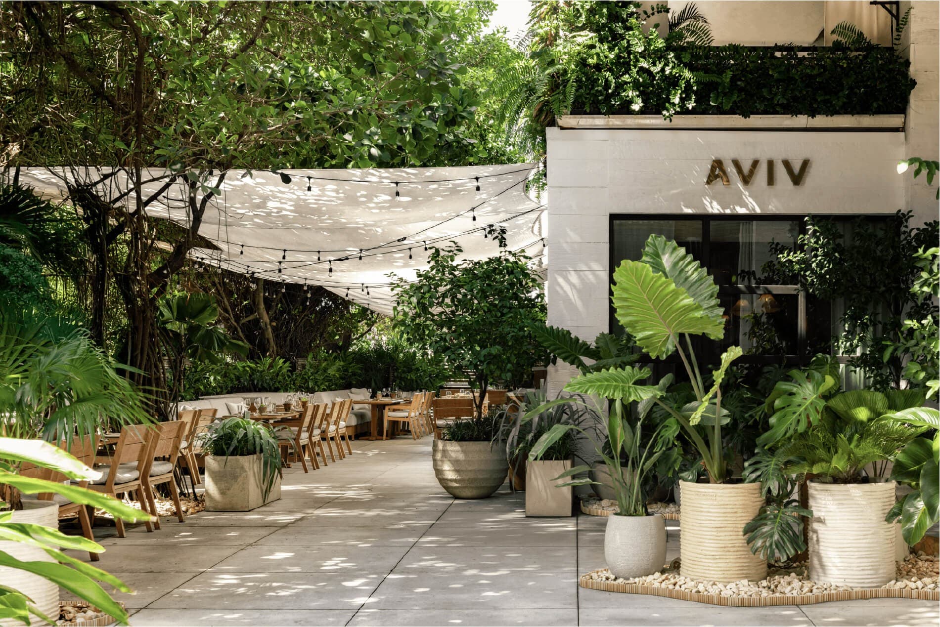 Outdoor dining area at AVIV in Miami Beach