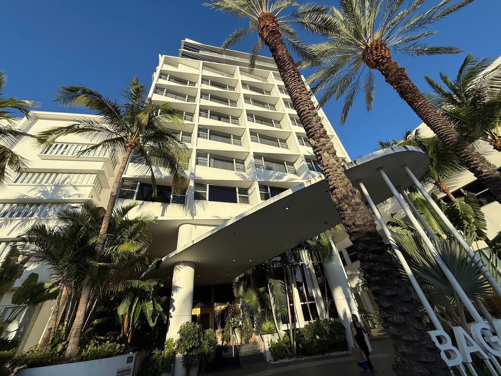 Bagatelle Miami Beach restaurant exterior with palm trees