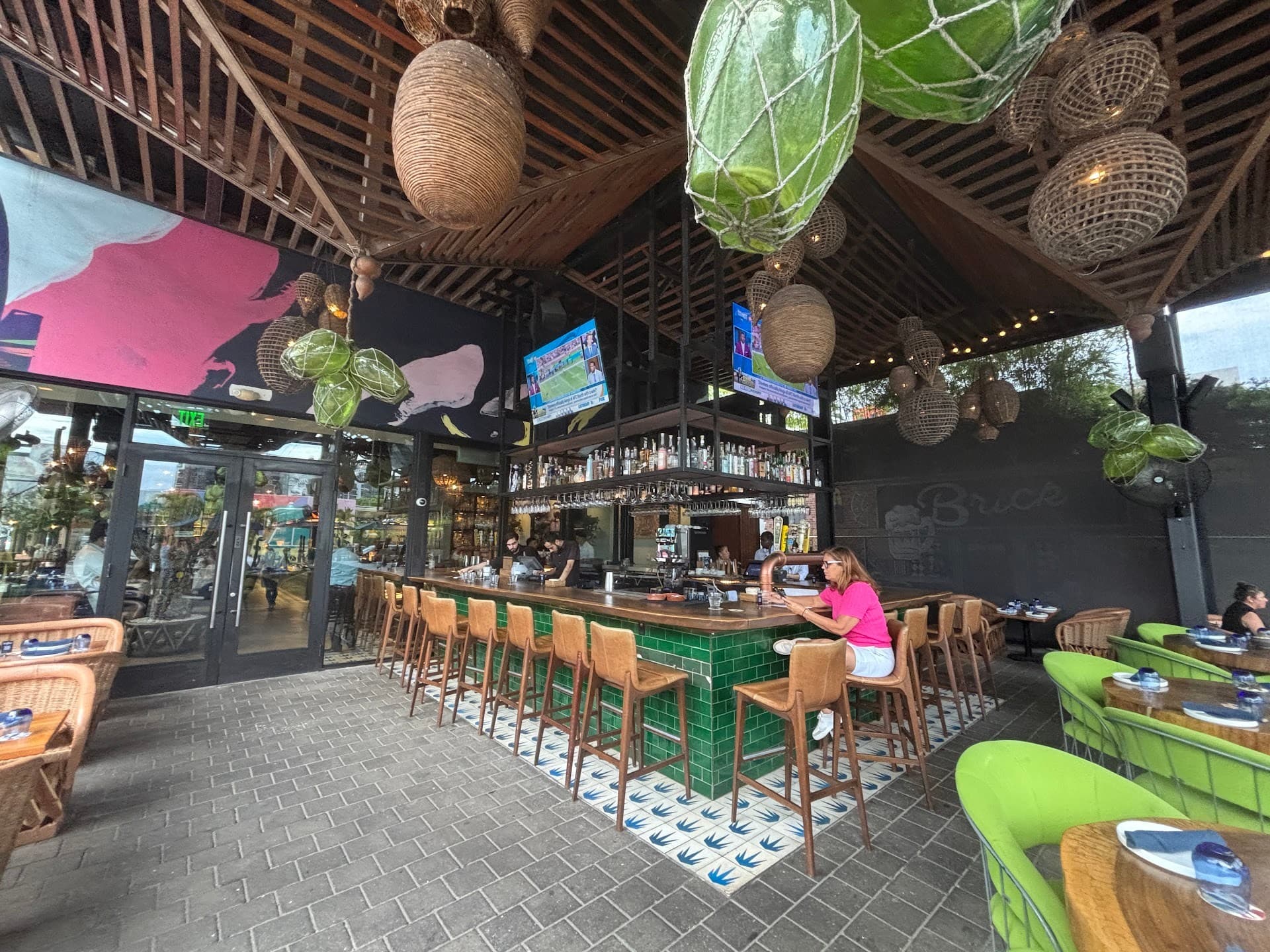 BAKAN restaurant interior featuring bar and seating in Miami