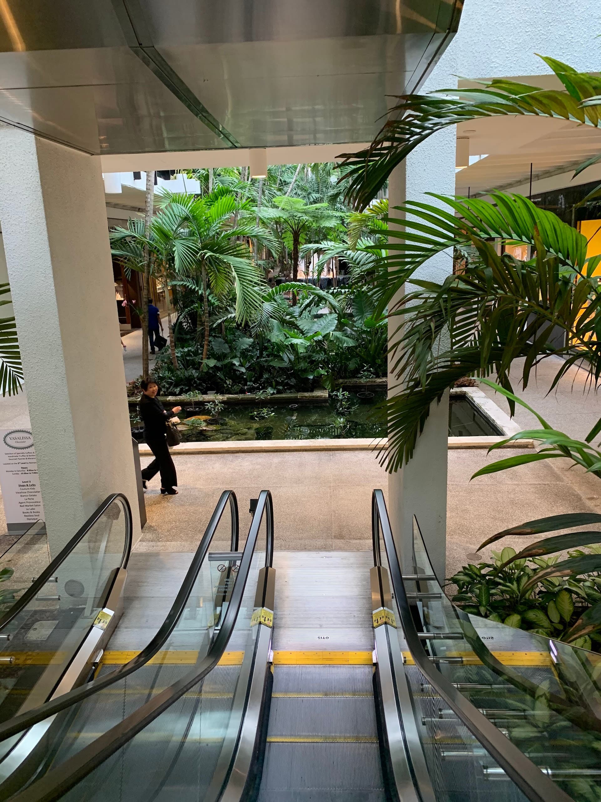 Bal Harbour Beach interior with lush greenery and pond in Miami