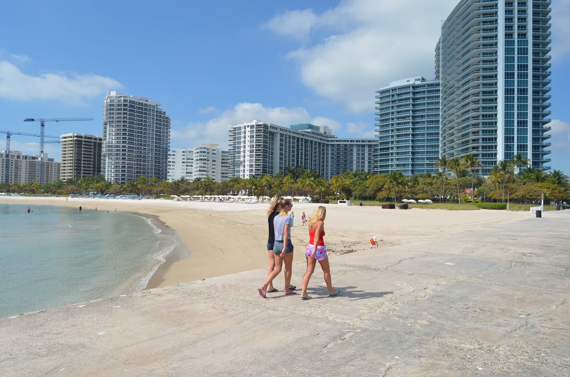Bal Harbour Beach view with people walking in Miami