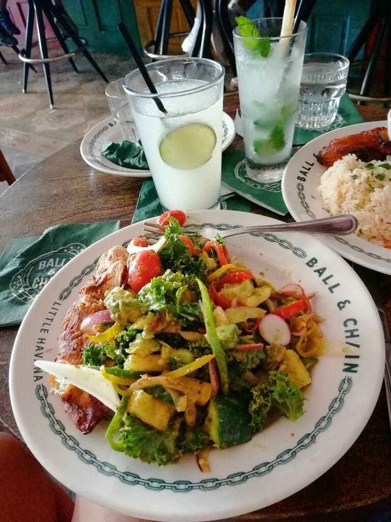 Fresh dish at Ball & Chain in Miami, vibrant salad and chicken