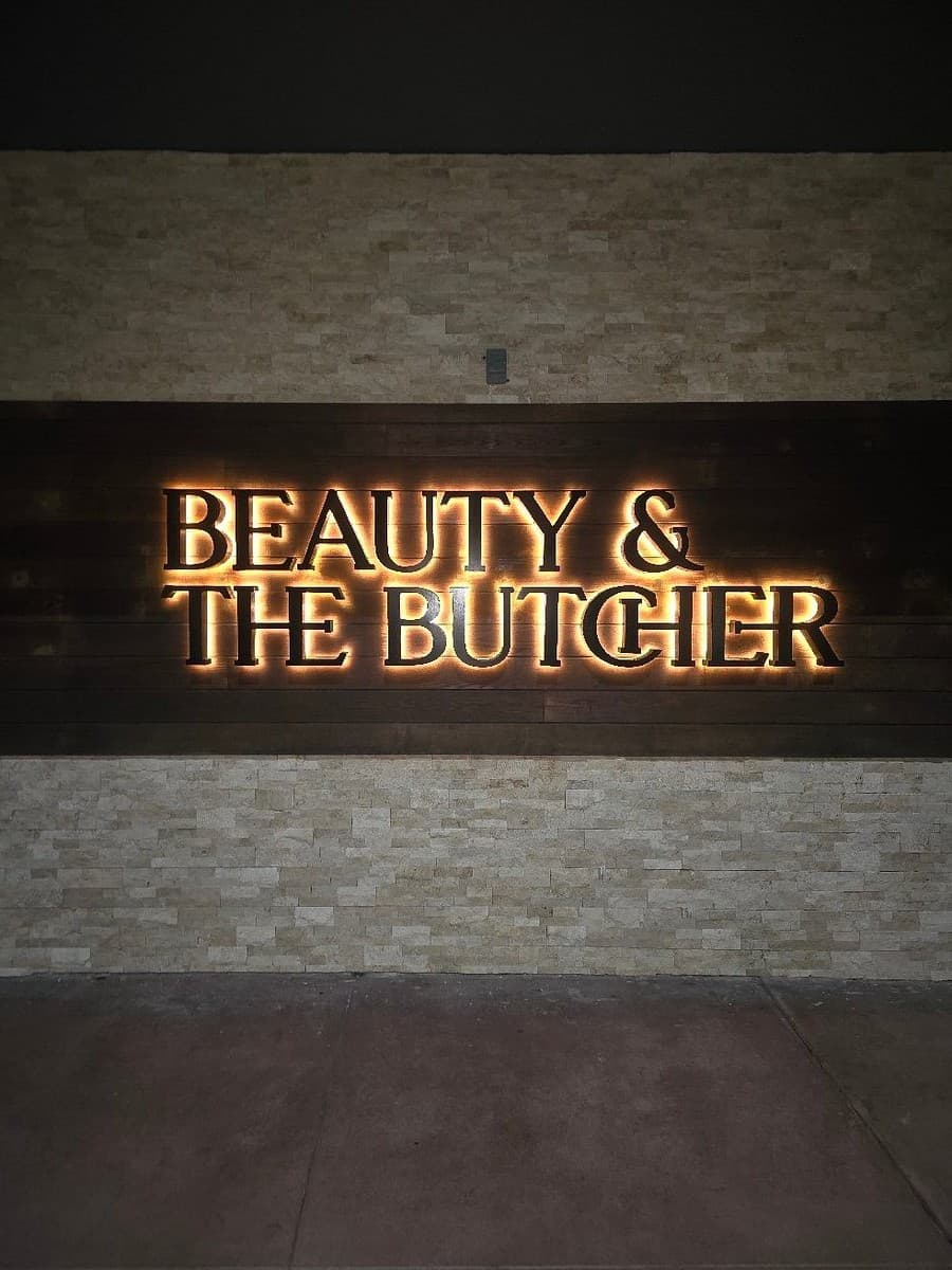 Beauty & The Butcher restaurant sign on S Red Rd