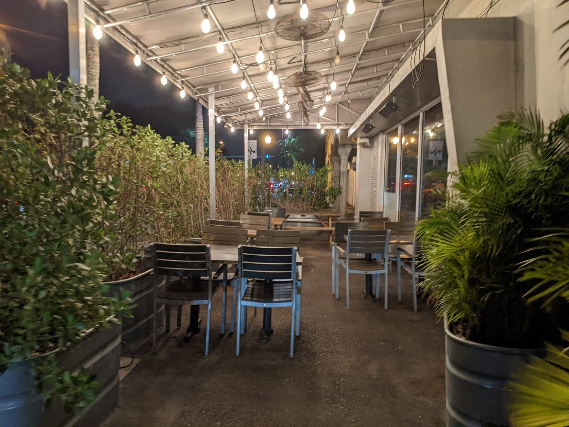 Patio seating at Blue Collar restaurant in Miami