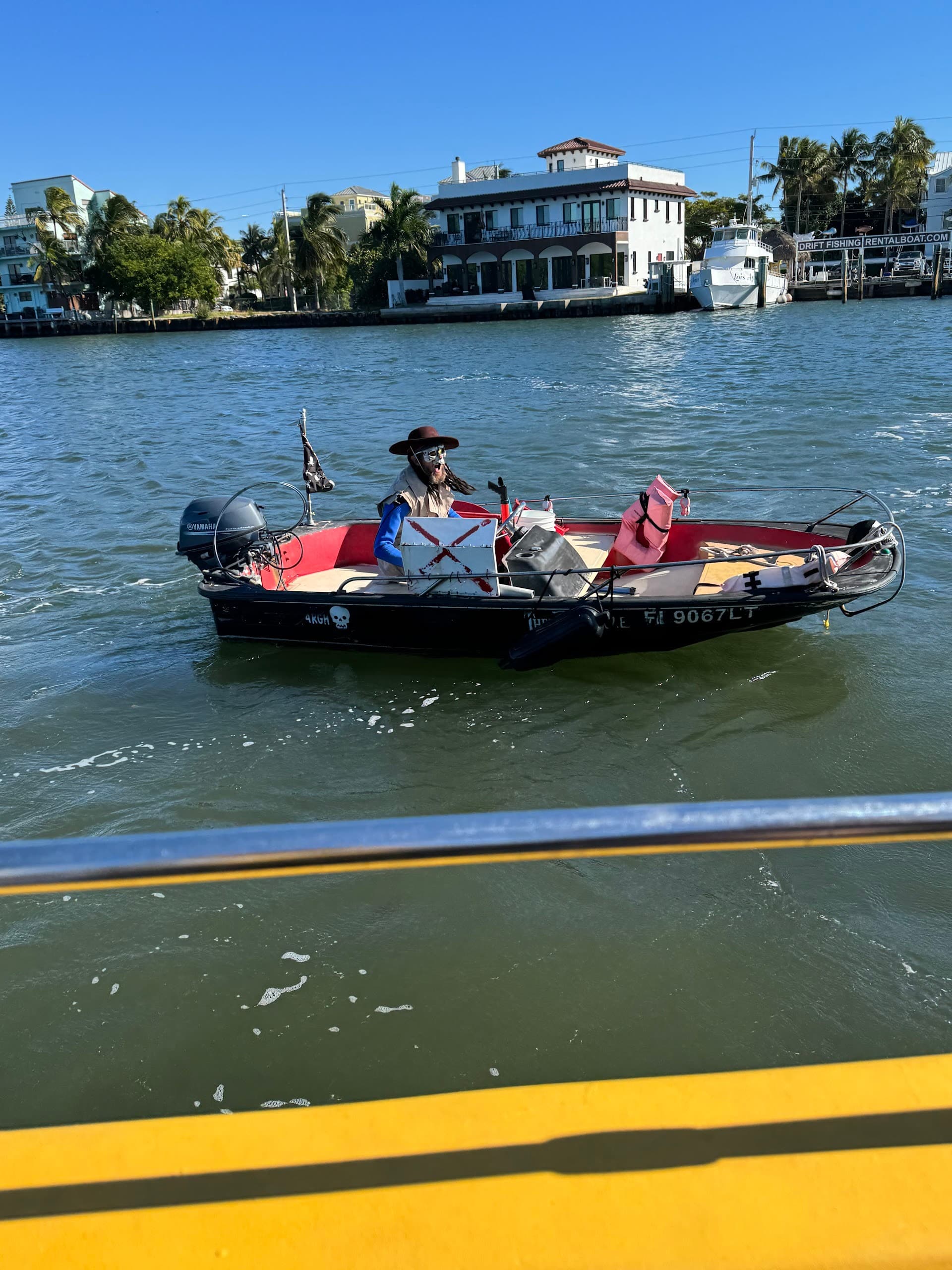Pirate-themed boat on water near BlueFoot Pirate Adventures