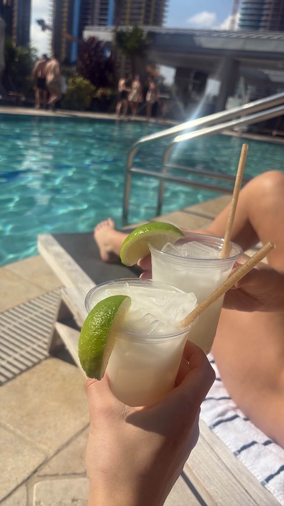 Refreshing cocktails by the pool at Brickell Arch, Miami