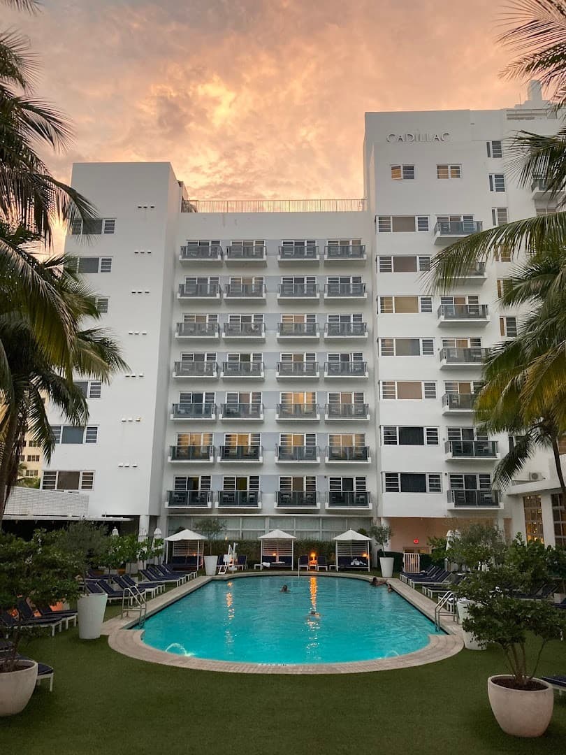 Cadillac Hotel & Beach Club pool area at sunset