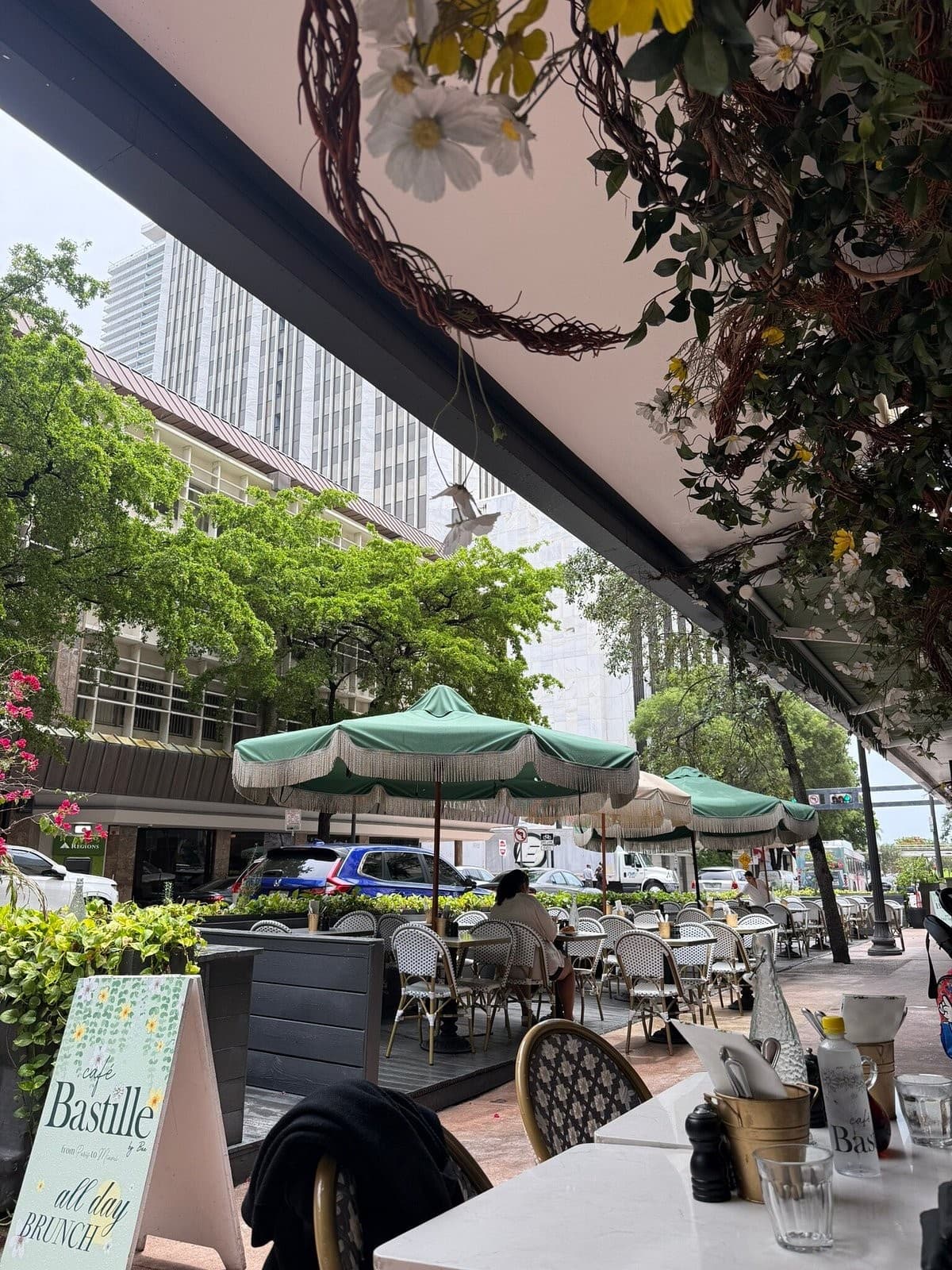 Café Bastille patio dining scene in Miami