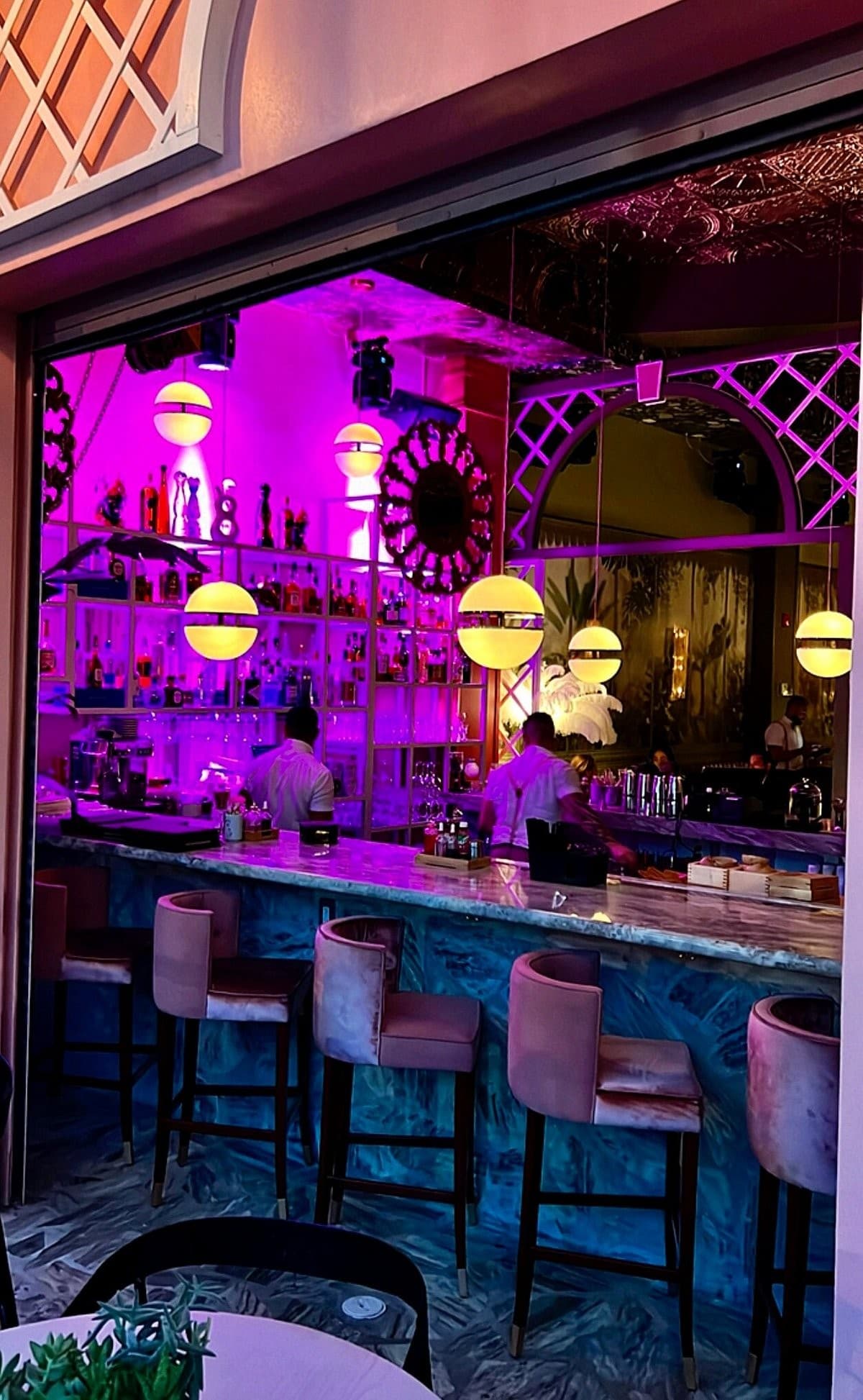 Calle Dragones Miami bar interior with vibrant lighting