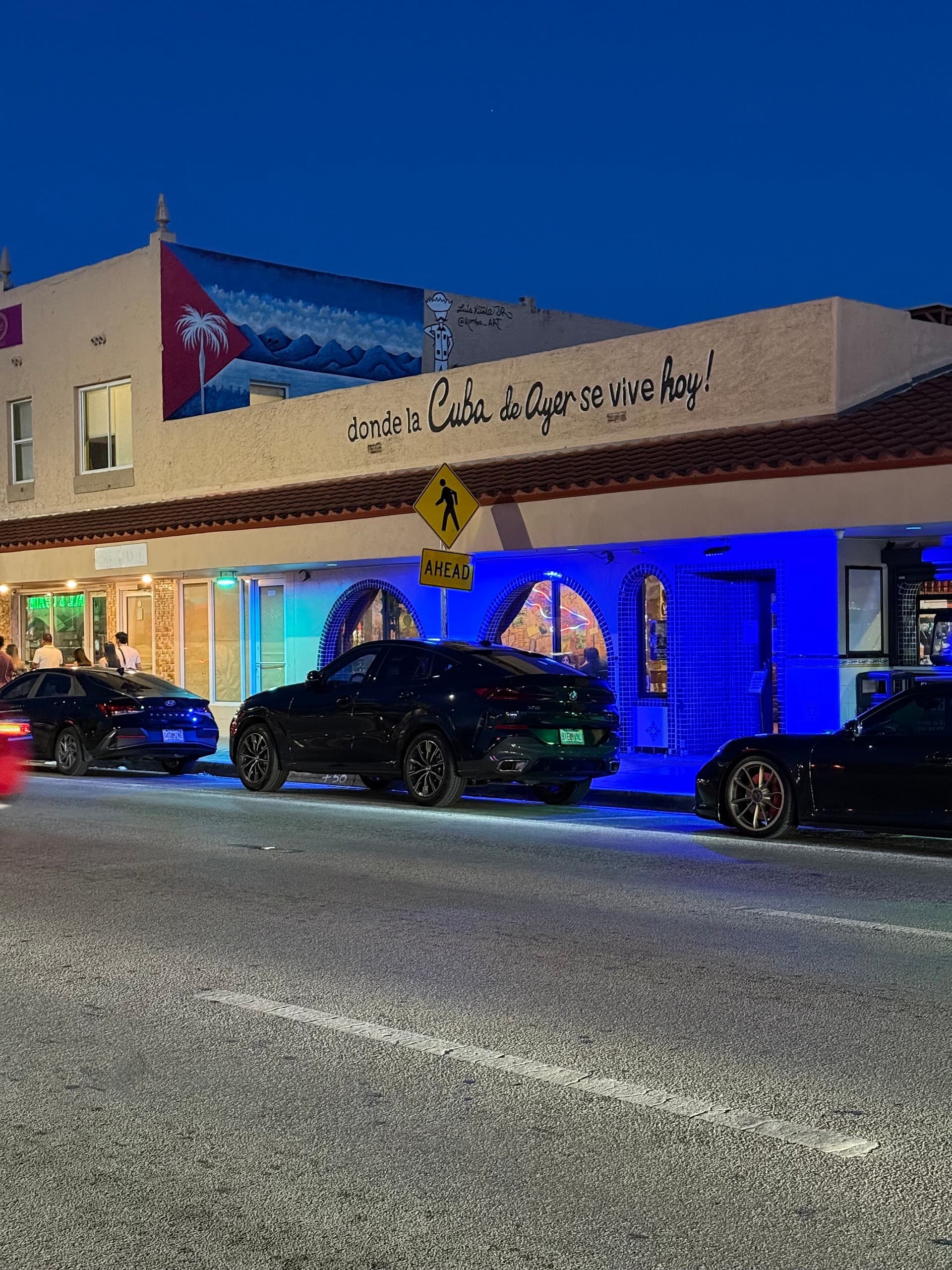 Calle Ocho Miami restaurant front at night