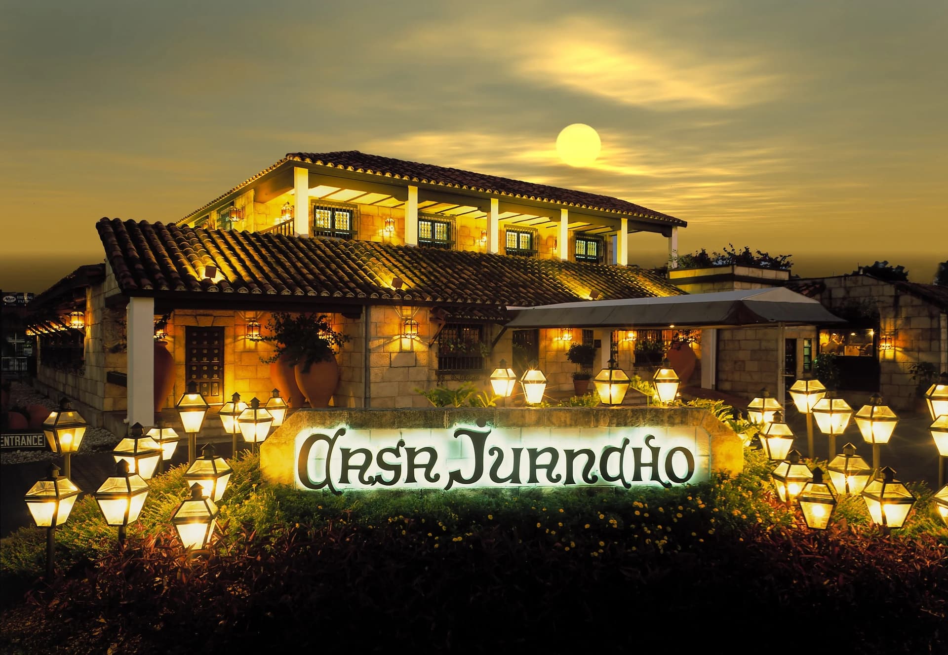 Casa Juancho restaurant exterior in Miami at sunset