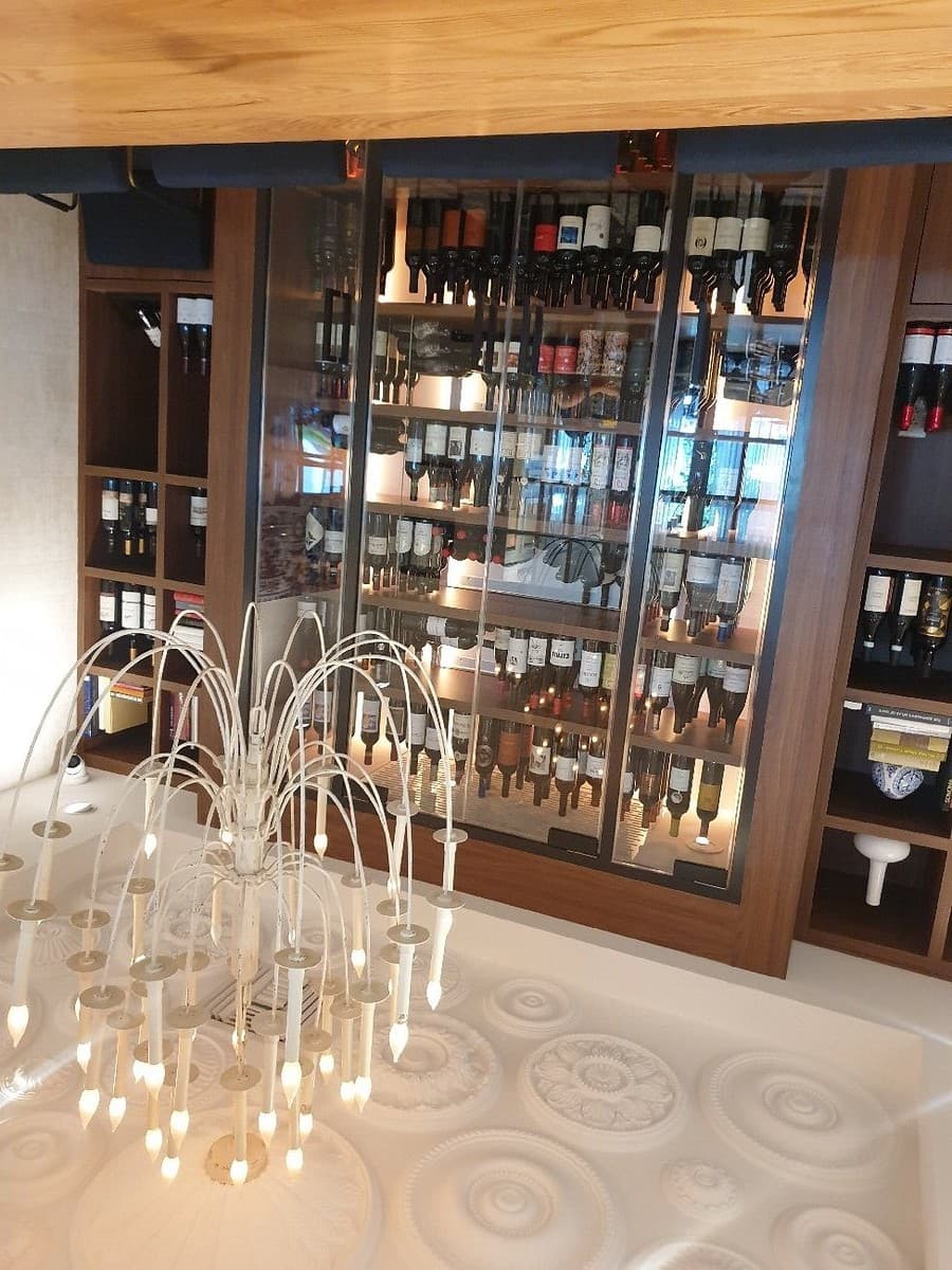 Casa Mariano interior with wine display in Doral
