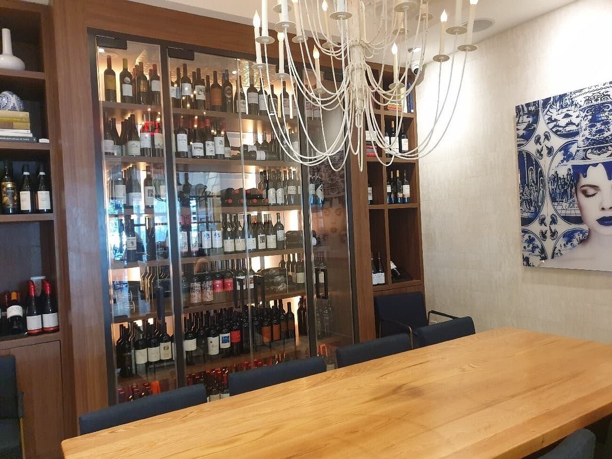 Casa Mariano interior with wine display in Doral