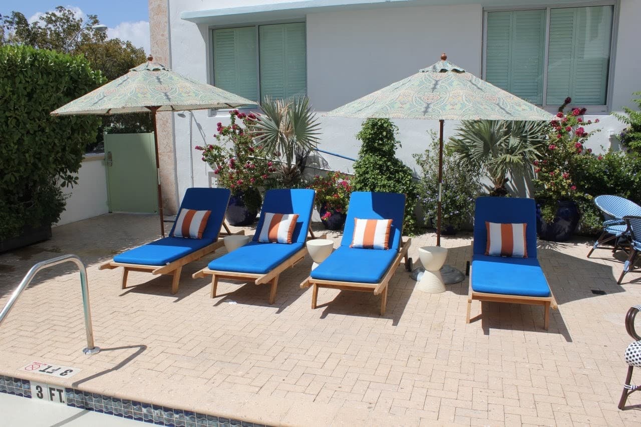 Lounge chairs by the pool at Circa 39 Miami Beach