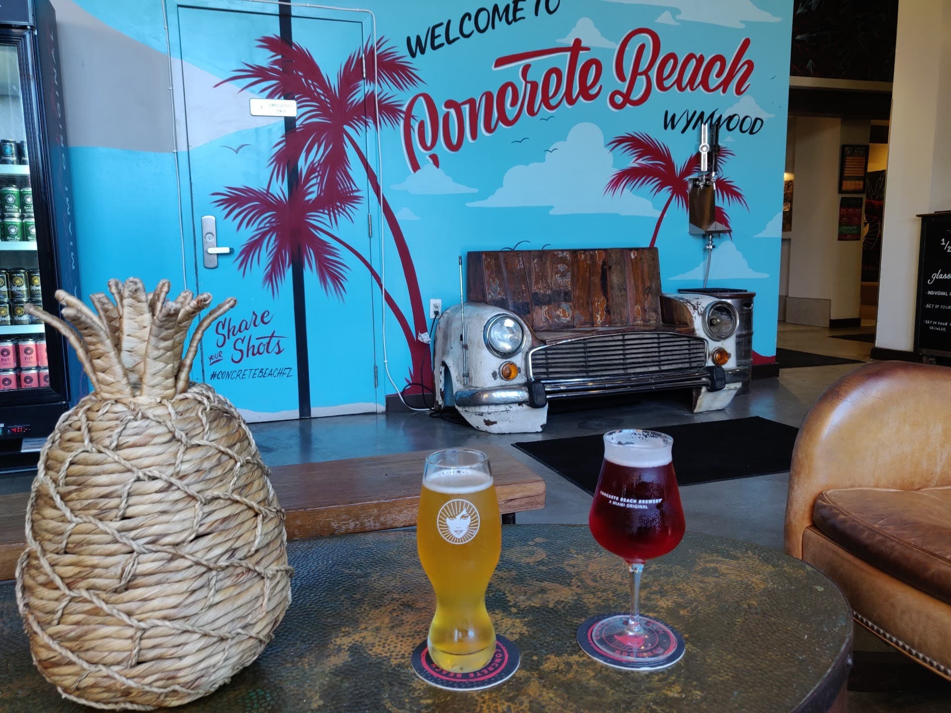 Concrete Beach Brewery interior with drinks in Miami