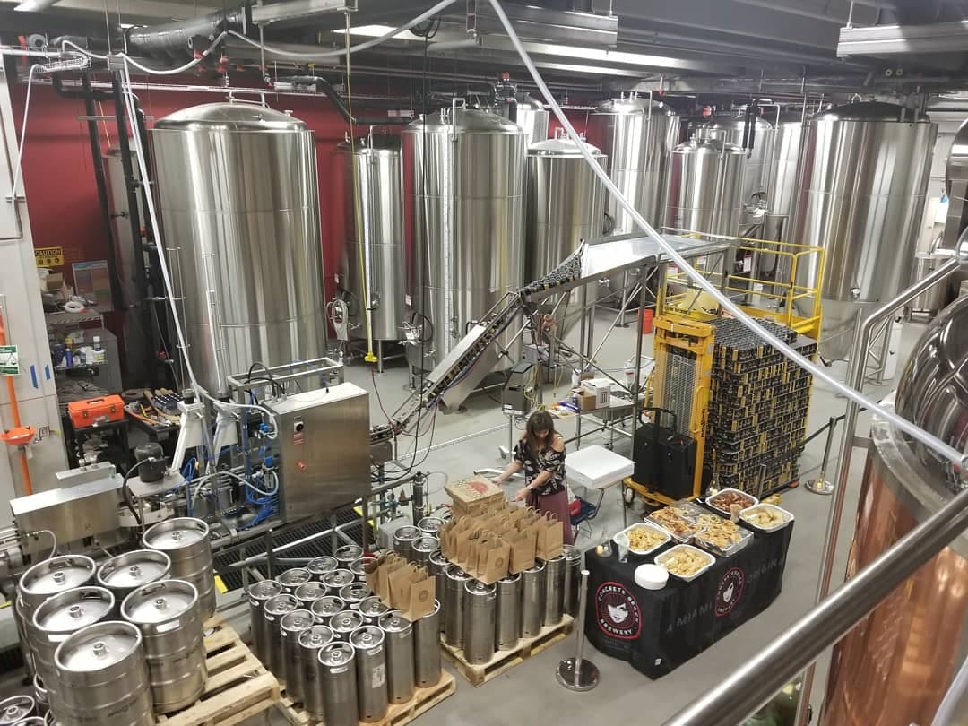 Concrete Beach Brewery interior featuring brewing equipment in Miami