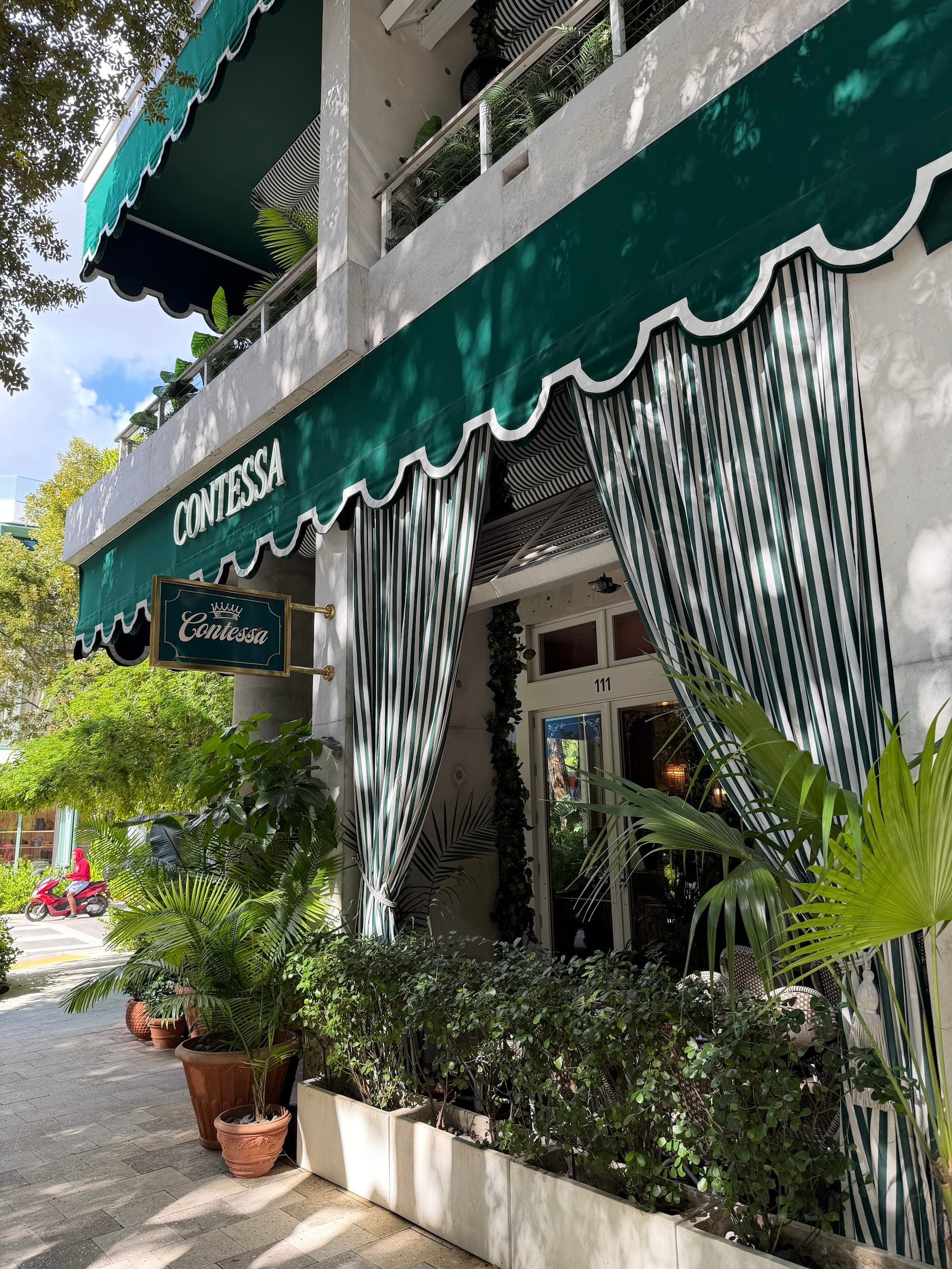 Contessa Miami restaurant exterior with greenery