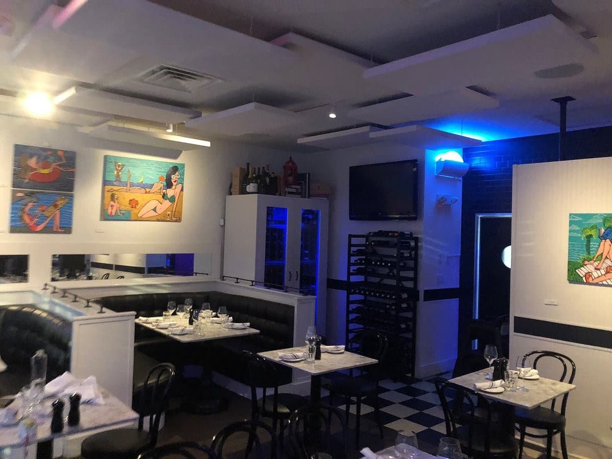 Costa Med Bistro interior dining scene in Key Biscayne