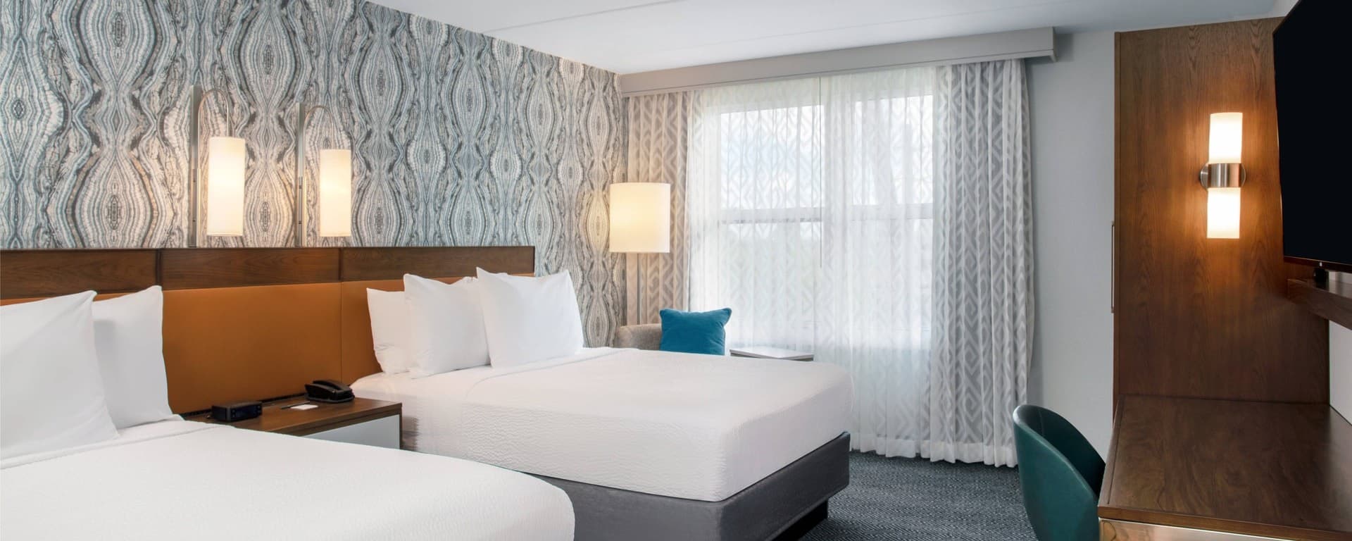 Modern guest room at Courtyard by Marriott Aventura