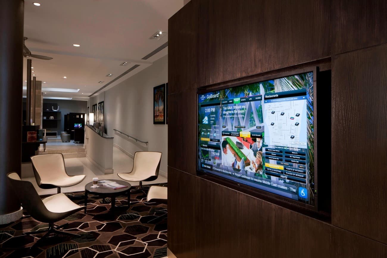 Modern lobby area at Courtyard by Marriott Miami Beach