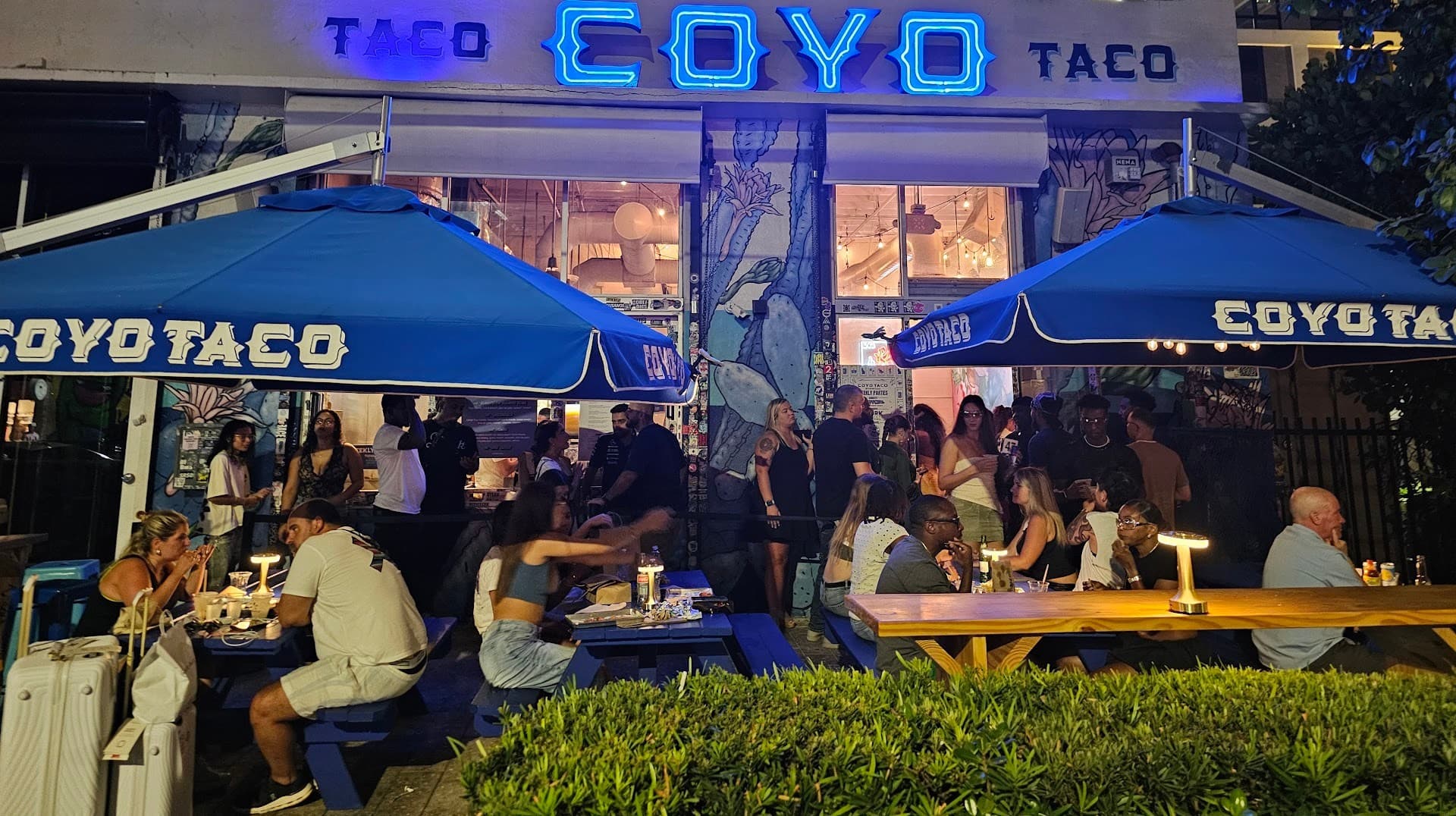 Coyo Taco outdoor seating area in Miami at night