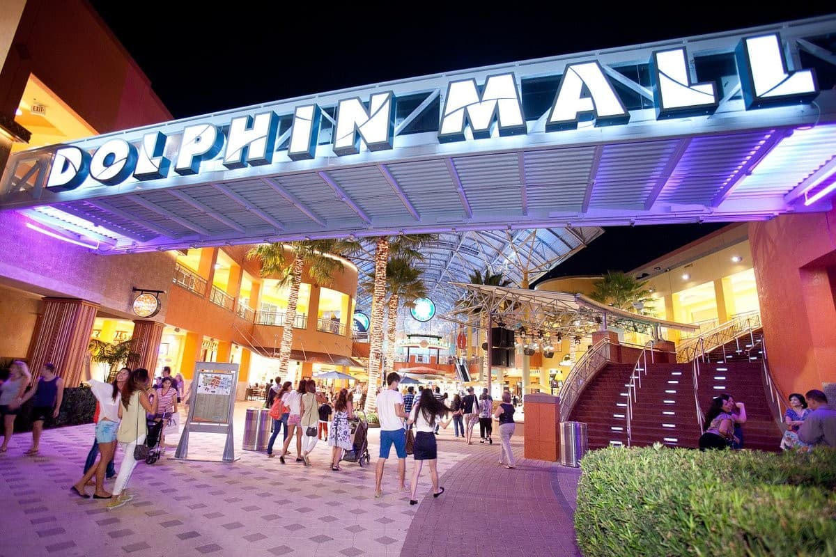 Dolphin Mall entrance lit at night, Miami