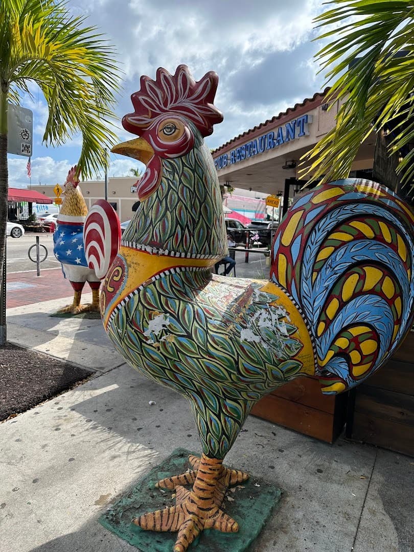 Colorful rooster sculpture at Domino Park in Miami