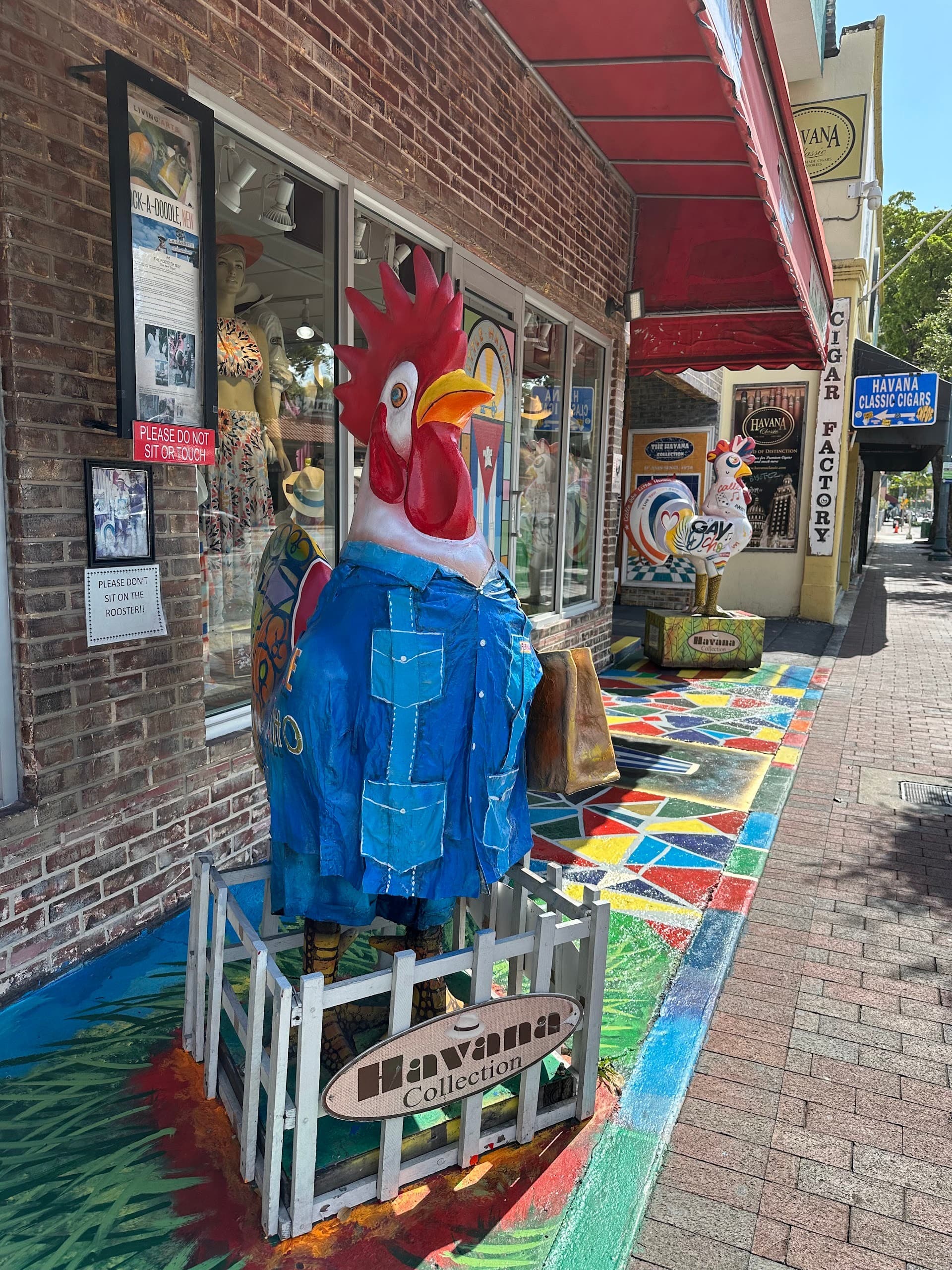 Colorful rooster statue at Domino Park in Miami