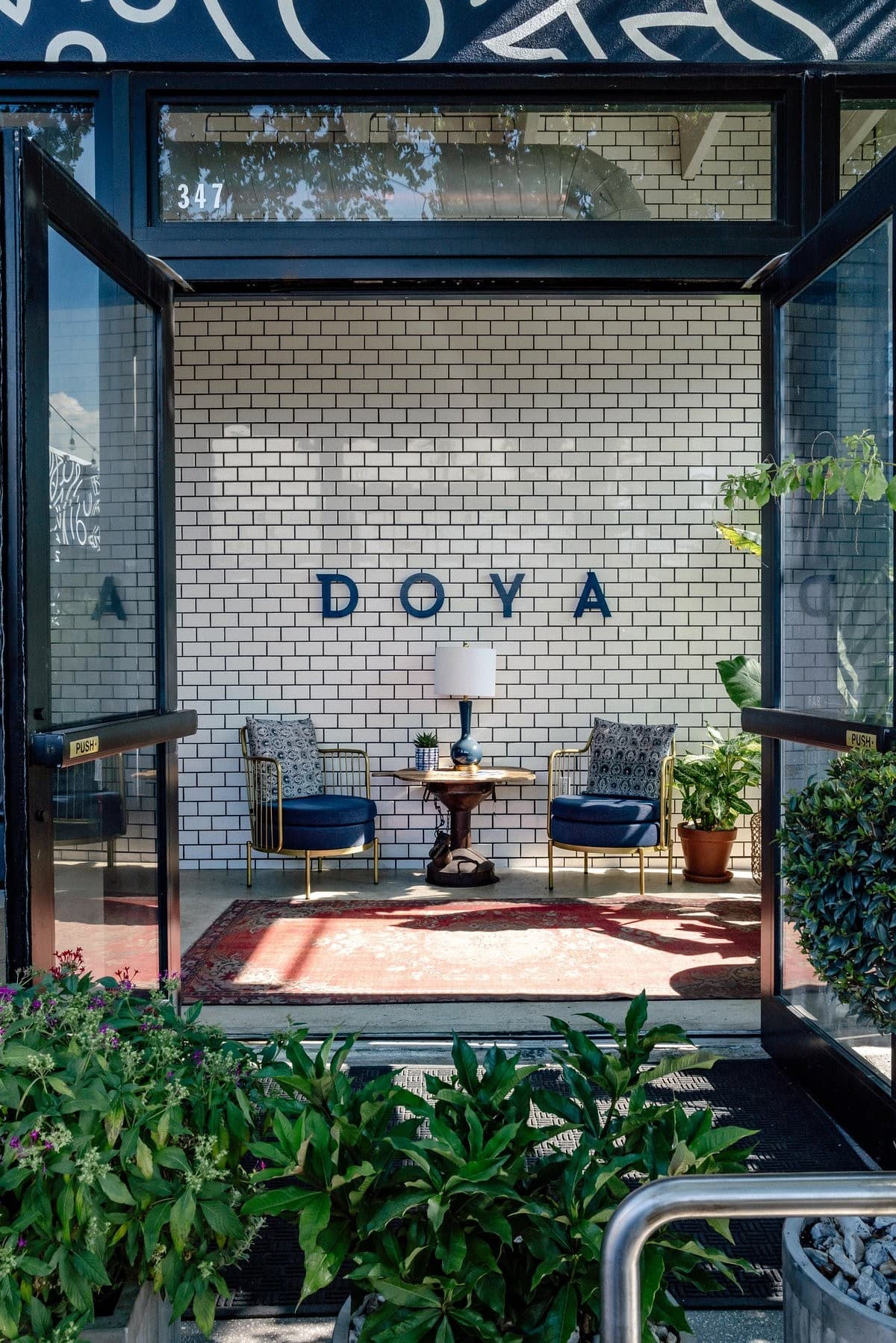 Doya restaurant entrance interior seating in Miami