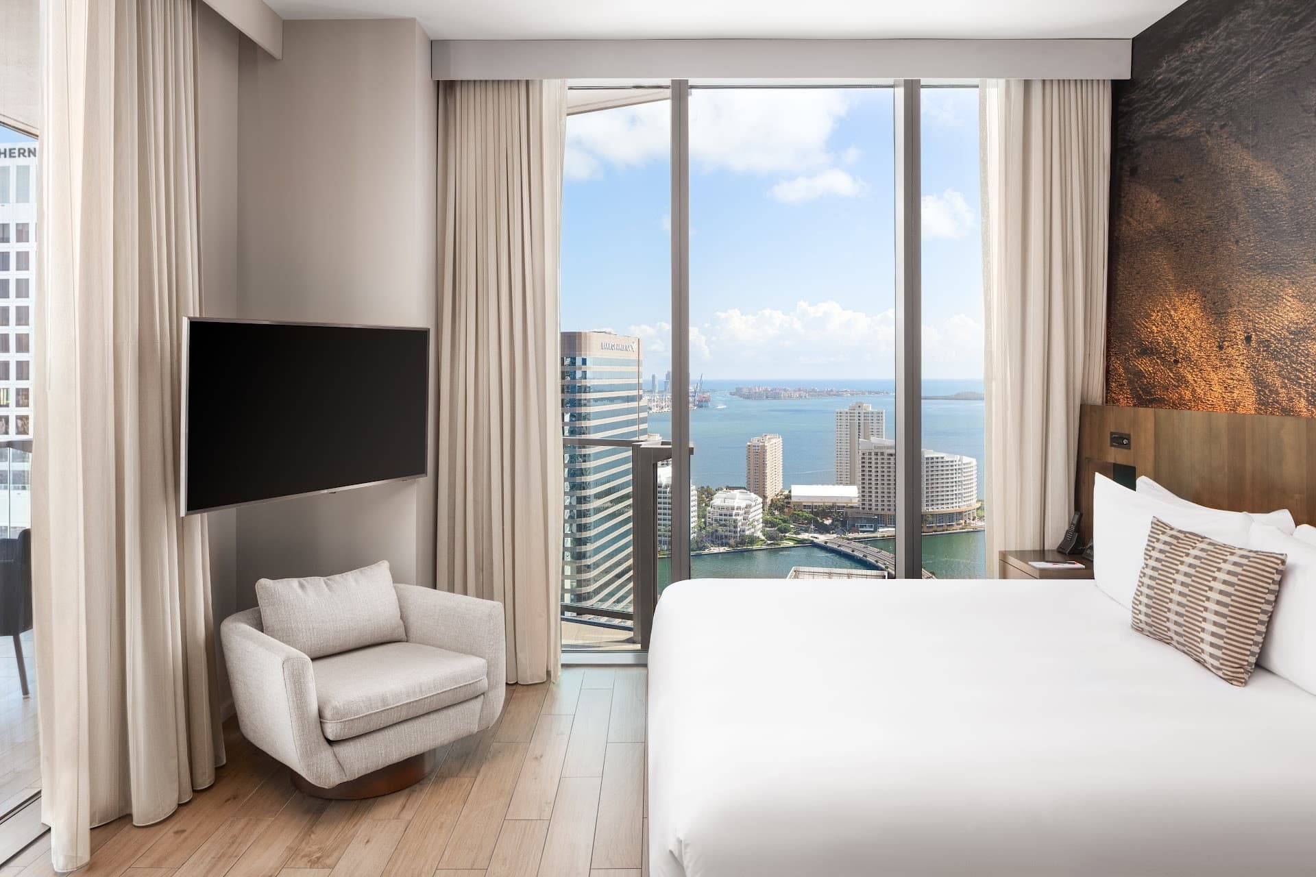 Modern guest room at EAST Miami with skyline view