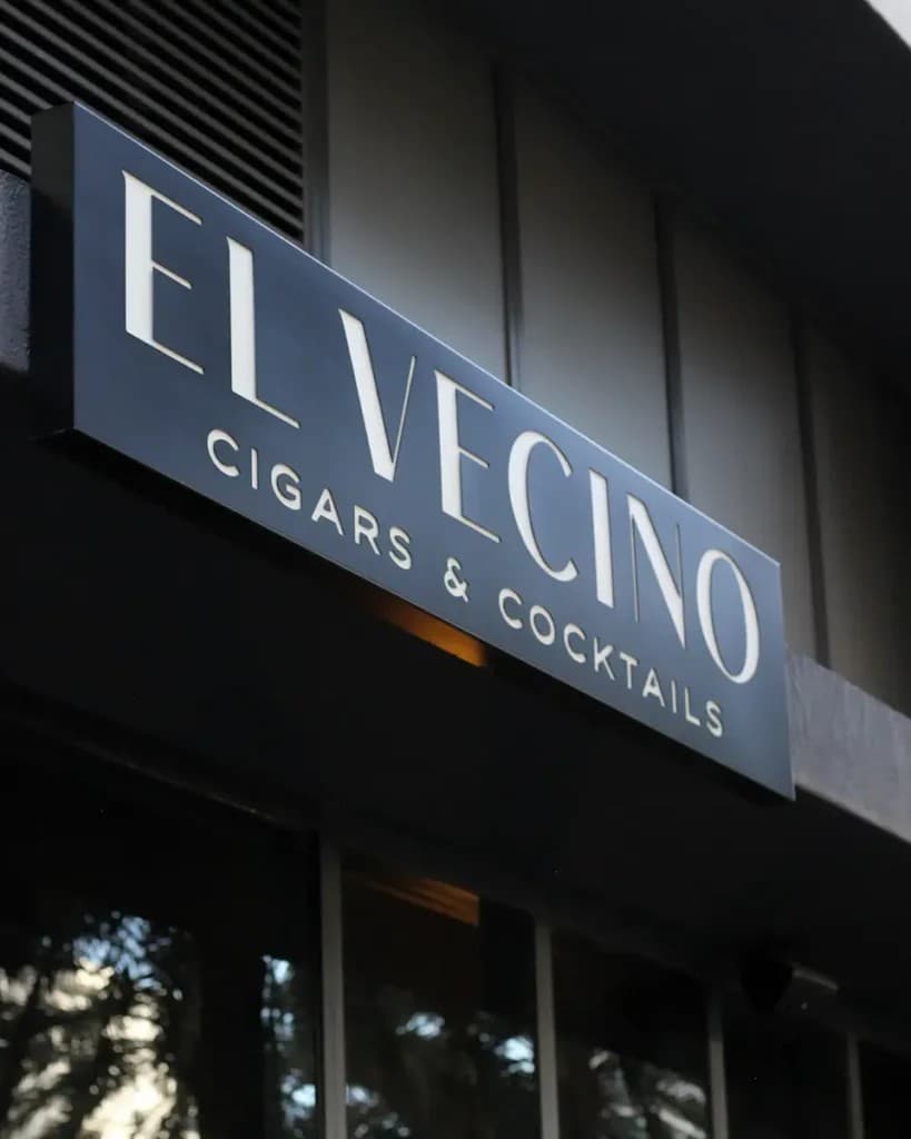 El Vecino sign in Miami, cigars and cocktails