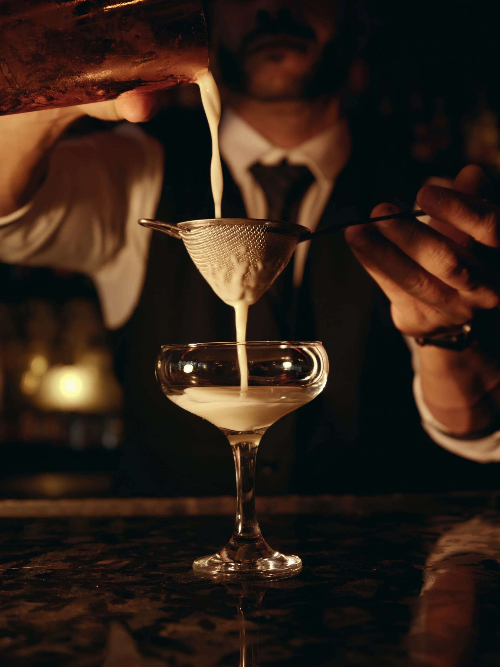 Cocktail being poured at Empire Social Lounge in Miami