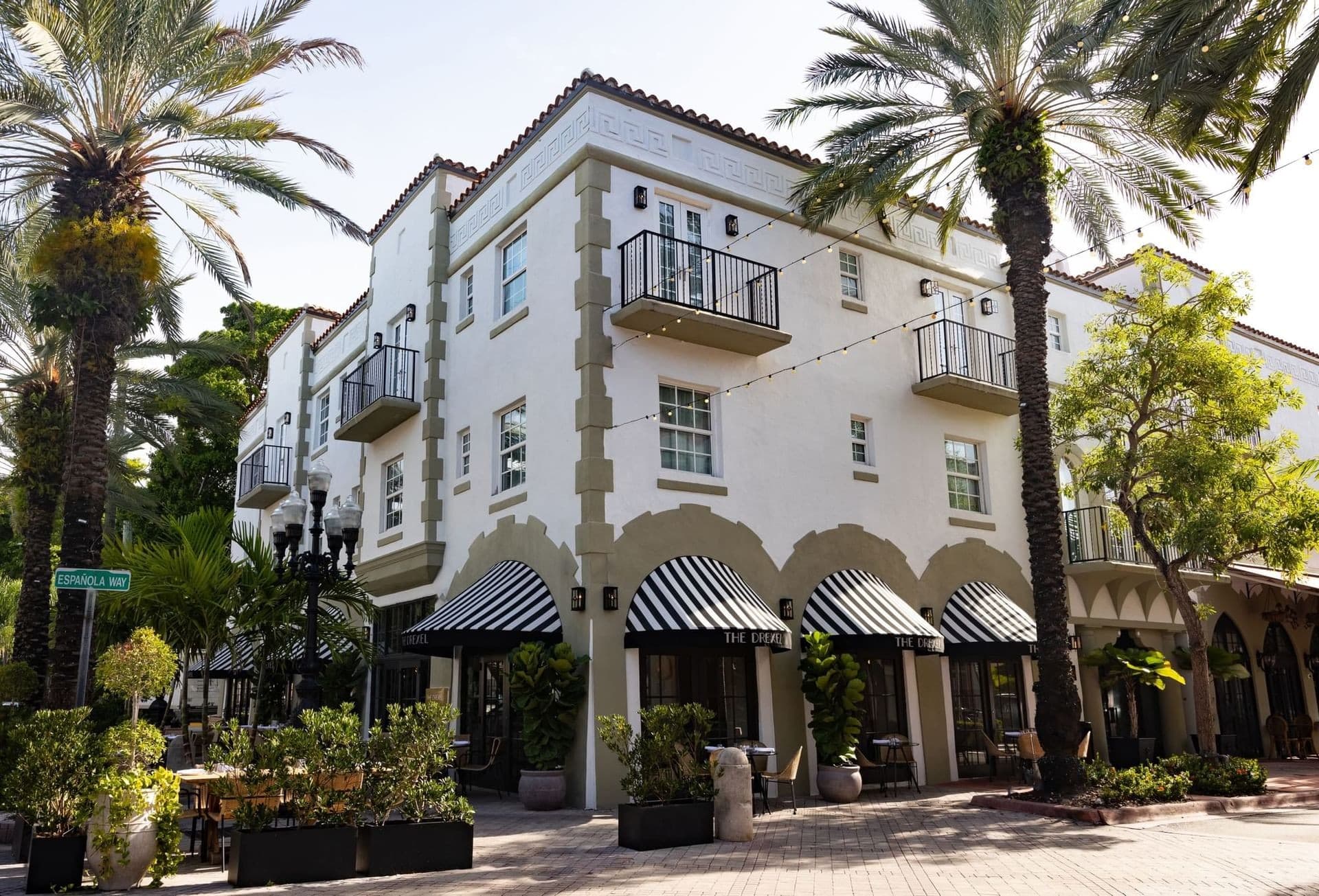 Esmé Miami Beach hotel exterior with palm trees