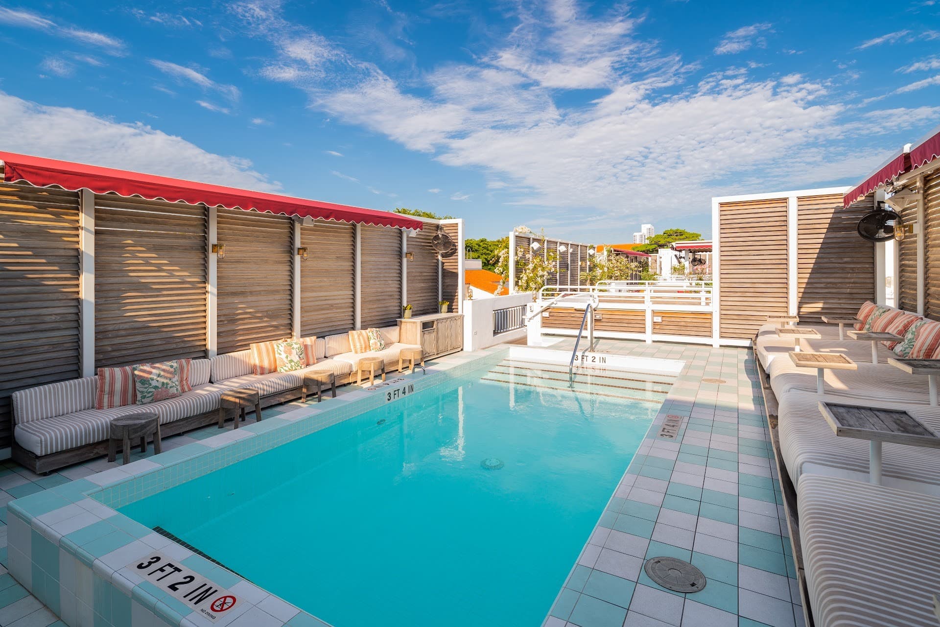 Esmé Miami Beach pool area with sun loungers