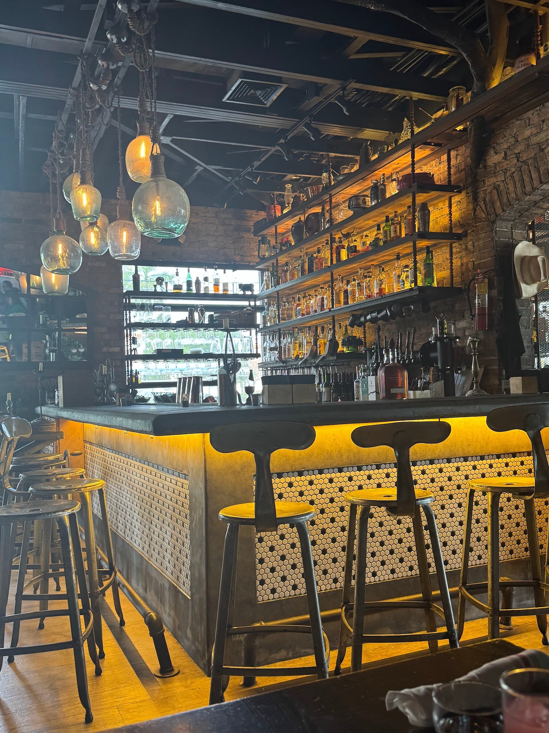 Stylish bar interior at Finka Table & Tap in Miami