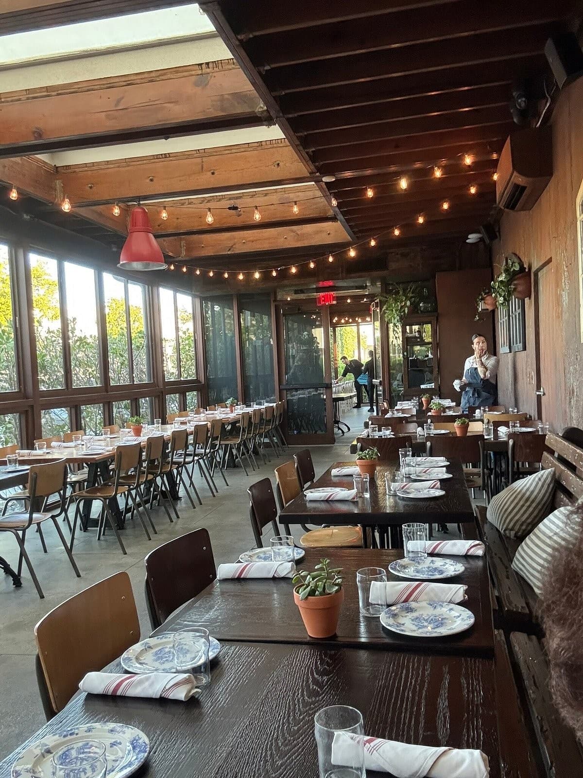 Finka Table & Tap interior dining scene in Miami
