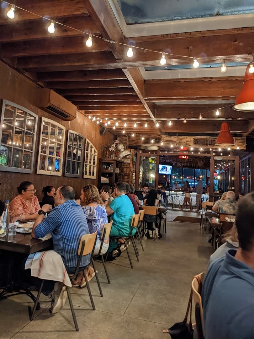 Interior dining scene at Finka Table & Tap in Miami