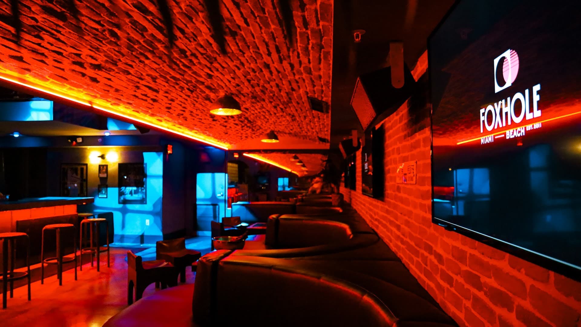 Interior of Foxhole Bar in Miami Beach, vibrant nightlife ambiance