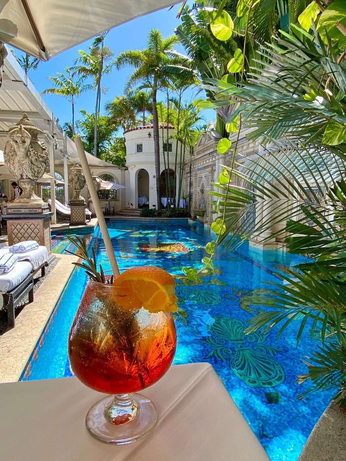 Cocktail by the pool at Gianni's At The Former Versace Mansion, Miami Beach