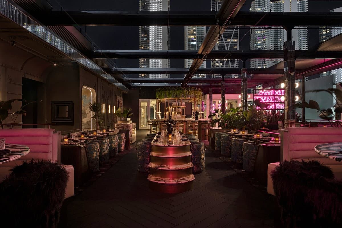 Stylish interior of Giselle Miami restaurant at night